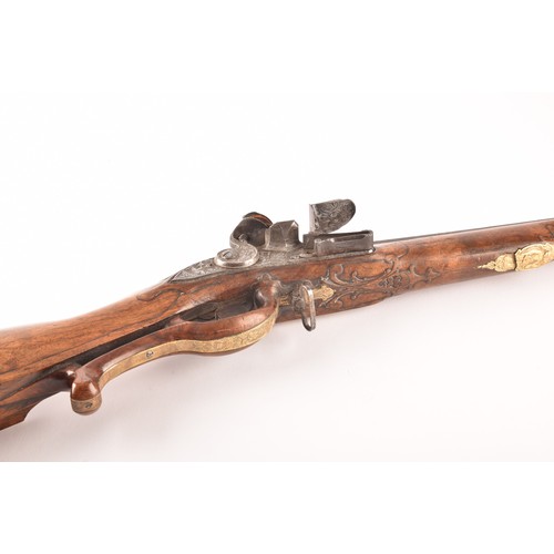 315 - A fine and rare 18th century Austrian flint lock rifle, with swamped damascus barrel, cylindrical ov... 