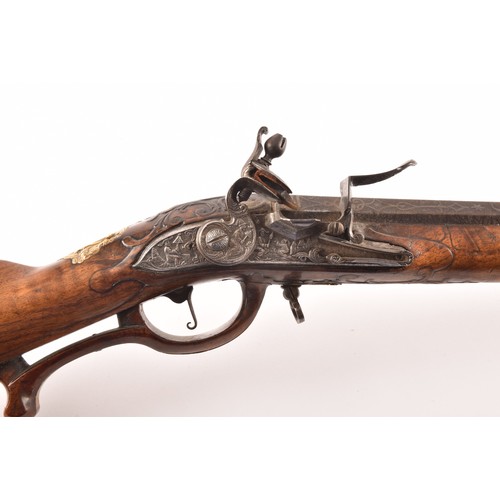 315 - A fine and rare 18th century Austrian flint lock rifle, with swamped damascus barrel, cylindrical ov... 