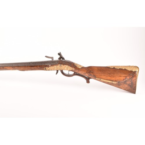 315 - A fine and rare 18th century Austrian flint lock rifle, with swamped damascus barrel, cylindrical ov... 