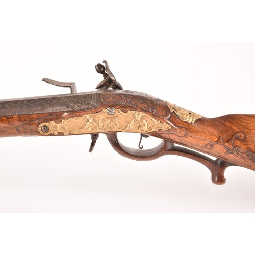 315 - A fine and rare 18th century Austrian flint lock rifle, with swamped damascus barrel, cylindrical ov... 