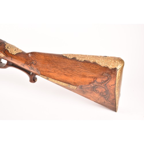 315 - A fine and rare 18th century Austrian flint lock rifle, with swamped damascus barrel, cylindrical ov... 