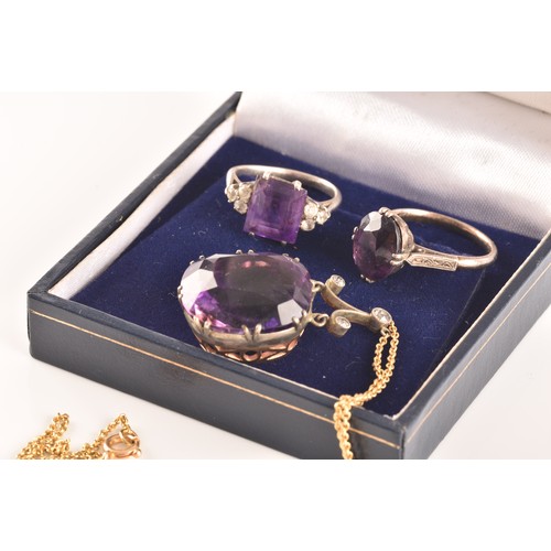 87 - A 15ct yellow gold and silver pendant and chain set with a cushion shape mixed cut amethyst with an ... 