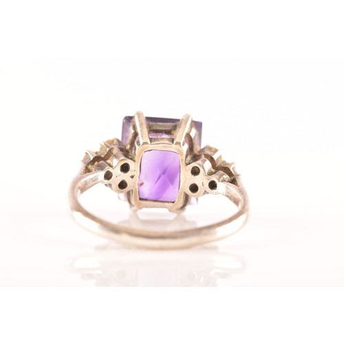 87 - A 15ct yellow gold and silver pendant and chain set with a cushion shape mixed cut amethyst with an ... 