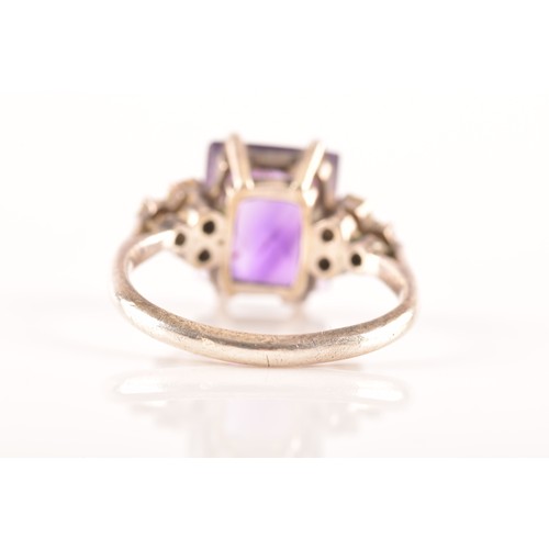 87 - A 15ct yellow gold and silver pendant and chain set with a cushion shape mixed cut amethyst with an ... 