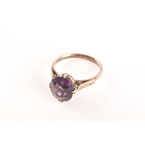 87 - A 15ct yellow gold and silver pendant and chain set with a cushion shape mixed cut amethyst with an ... 