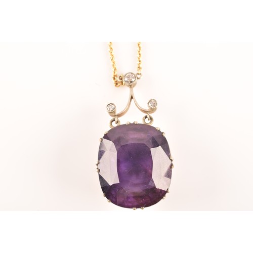 87 - A 15ct yellow gold and silver pendant and chain set with a cushion shape mixed cut amethyst with an ... 