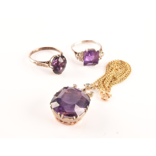 87 - A 15ct yellow gold and silver pendant and chain set with a cushion shape mixed cut amethyst with an ... 