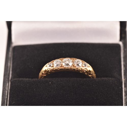 88 - A Victorian diamond five stone ring, set with five round old cut diamonds, with a combined approxima... 