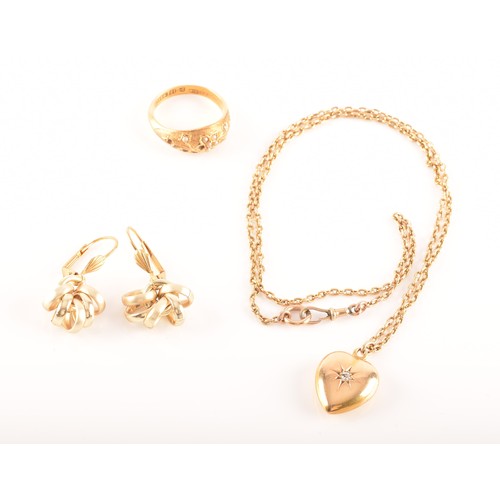 63 - A group of gold jewellery items including a diamond set 18ct yellow gold heart pendant with chain, A... 