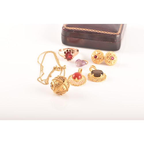 3 - A small group of gold jewellery, including a 10ct yellow gold almandine garnet set ring, an 18ct yel... 