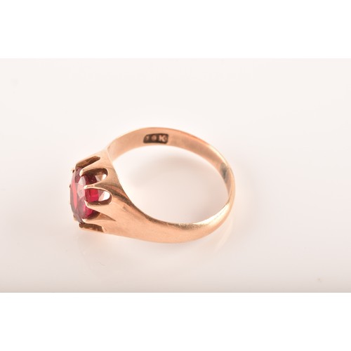 3 - A small group of gold jewellery, including a 10ct yellow gold almandine garnet set ring, an 18ct yel... 