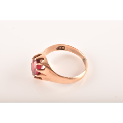 3 - A small group of gold jewellery, including a 10ct yellow gold almandine garnet set ring, an 18ct yel... 