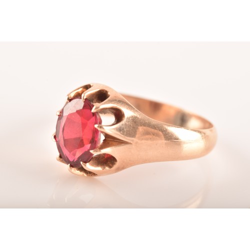 3 - A small group of gold jewellery, including a 10ct yellow gold almandine garnet set ring, an 18ct yel... 