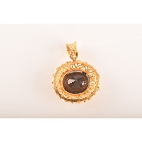 3 - A small group of gold jewellery, including a 10ct yellow gold almandine garnet set ring, an 18ct yel... 