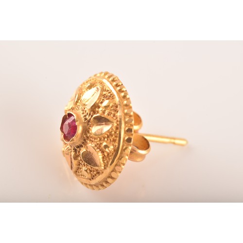 3 - A small group of gold jewellery, including a 10ct yellow gold almandine garnet set ring, an 18ct yel... 