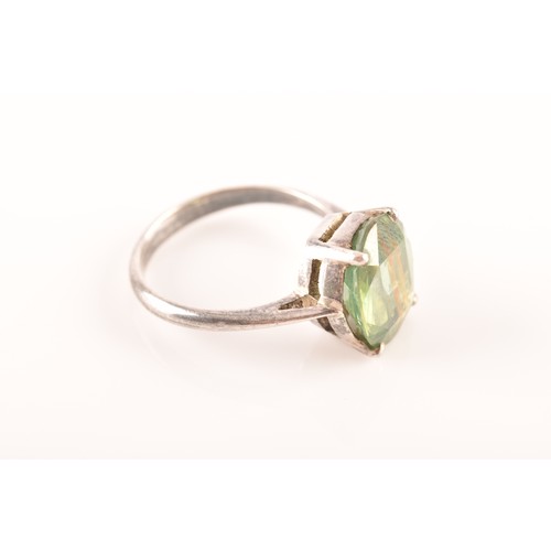 66 - A silver solitaire ring set with a green stone, size M 1/2, 3.4 grams, and a silver and yellow metal... 