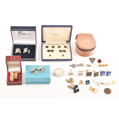 74 - A selection of cufflinks including an onyx and pearl gentlemans dress set in original fitted box, a ... 