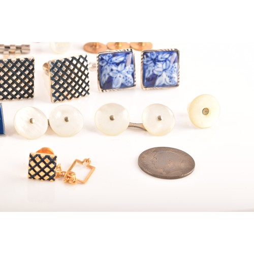 74 - A selection of cufflinks including an onyx and pearl gentlemans dress set in original fitted box, a ... 