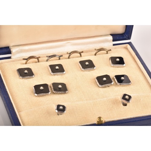 74 - A selection of cufflinks including an onyx and pearl gentlemans dress set in original fitted box, a ... 