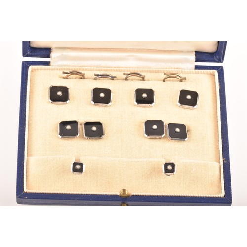 74 - A selection of cufflinks including an onyx and pearl gentlemans dress set in original fitted box, a ... 