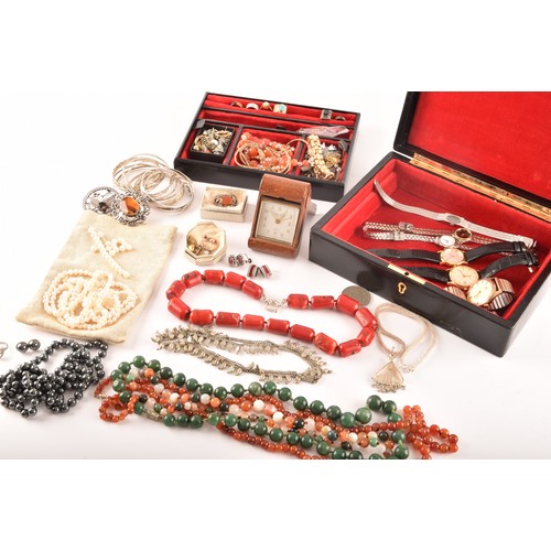 75 - A group of costume jewellery including a rose metal and opal ring, gold metal charms and studs, a pe... 