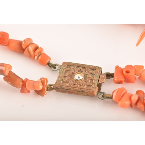 76 - A coral branch necklace with metal clasp, approximately 8 inches in length, a yellow metal zircon an... 