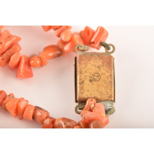 76 - A coral branch necklace with metal clasp, approximately 8 inches in length, a yellow metal zircon an... 