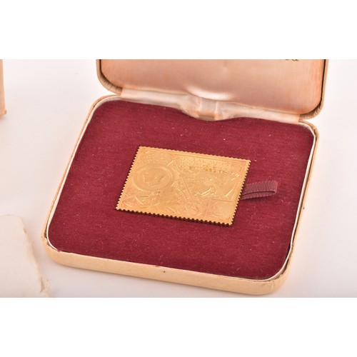 99 - Universal Portal Union 1874-1974, a 22ct gold stamp ingot, made to commemorate the Postal Union Cong... 