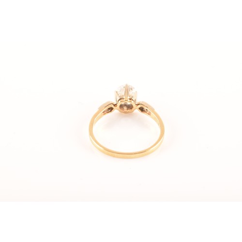 37 - A 18 carat yellow gold diamond solitaire, set to centre with a round brilliant cut diamond with an a... 