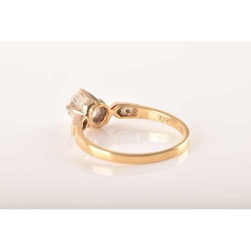 37 - A 18 carat yellow gold diamond solitaire, set to centre with a round brilliant cut diamond with an a... 