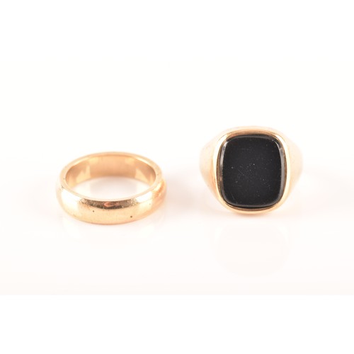 38 - A 9ct yellow gold and onyx ring, full hallmarks for Birmingham 1967, size M 1/2, and a 9ct yellow go... 