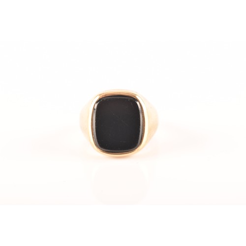 38 - A 9ct yellow gold and onyx ring, full hallmarks for Birmingham 1967, size M 1/2, and a 9ct yellow go... 