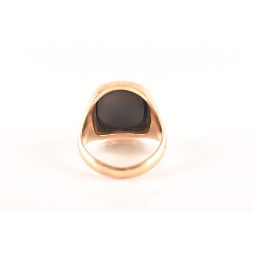 38 - A 9ct yellow gold and onyx ring, full hallmarks for Birmingham 1967, size M 1/2, and a 9ct yellow go... 