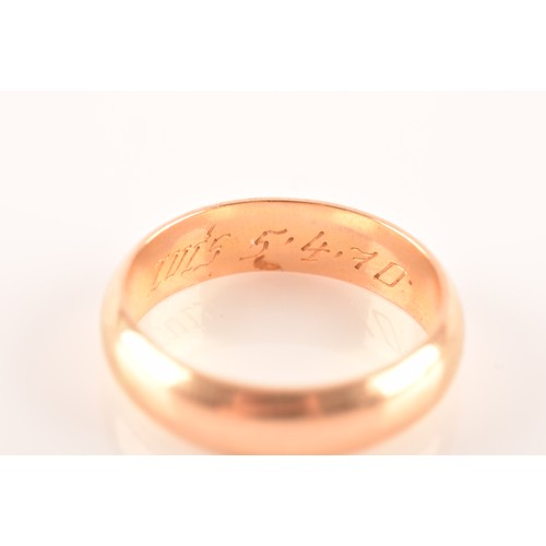 39 - A yellow gold wedding band, bearing personalised inscription to interior of shank 'Luis 5.4.70', con... 