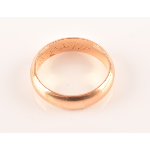 39 - A yellow gold wedding band, bearing personalised inscription to interior of shank 'Luis 5.4.70', con... 