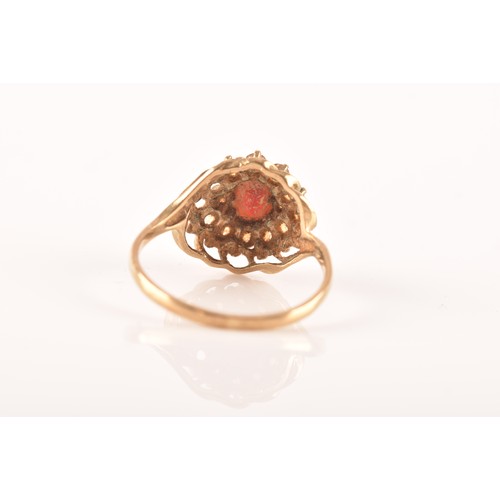 43 - A small group of gold rings, including a 9ct yellow gold garnet and paste ring, featuring full hallm... 