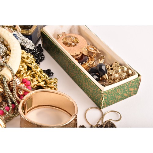 54 - A large collection of costume jewellery and miscellaneous items to include, a silver charm bracelet,... 