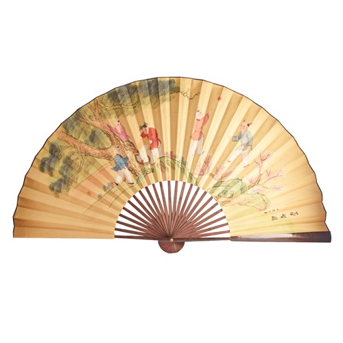 246 - A very large Chinese painted decorative display fan, painted with a scene of children playing by a t... 