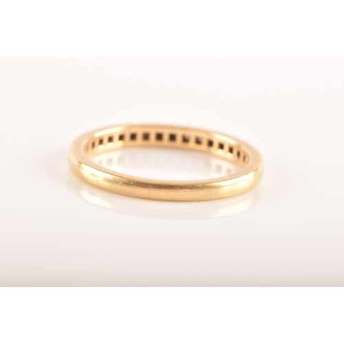 7 - Tiffany & Co. A Lucida 18ct yellow gold diamond half eternity ring, set with 17 brilliant cut di... 