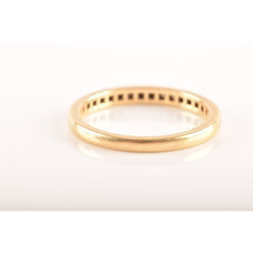 7 - Tiffany & Co. A Lucida 18ct yellow gold diamond half eternity ring, set with 17 brilliant cut di... 