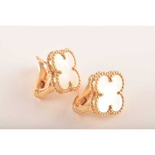 5 - Van Cleef & Arpels. A pair of 18ct yellow gold sweet Alhambra gold and mother-of-pearl stud earr... 