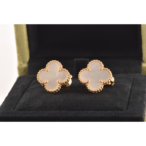 5 - Van Cleef & Arpels. A pair of 18ct yellow gold sweet Alhambra gold and mother-of-pearl stud earr... 