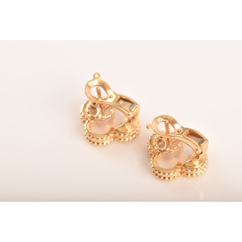 5 - Van Cleef & Arpels. A pair of 18ct yellow gold sweet Alhambra gold and mother-of-pearl stud earr... 