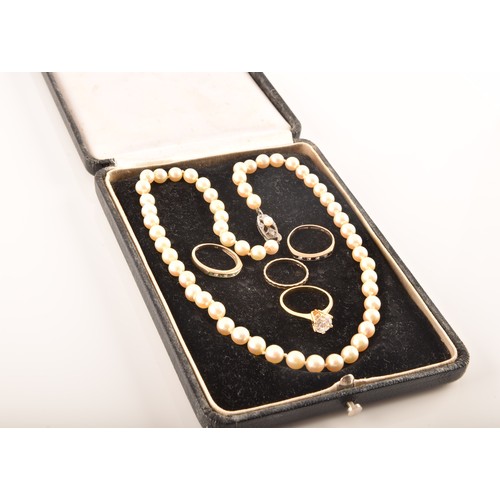 58 - A pearl necklace with silver metal decorated clasp, approximately 8 inches in length, a 9ct yellow g... 