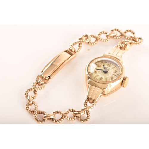 45 - A group of 9ct yellow gold jewellery, to include a Verity watch with bracelet strap, a box link chai... 