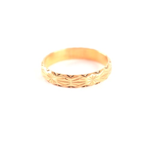 47 - A yellow gold engraved wedding band, size K, along with a yellow metal pin brooch, measuring approxi... 