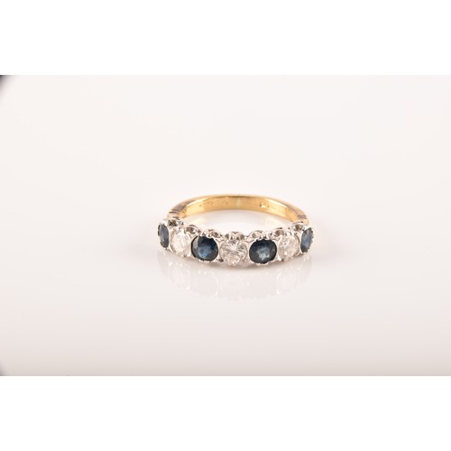 49 - An 18ct yellow gold, diamond, and sapphire ring, set with three round brilliant-cut diamonds and fou... 