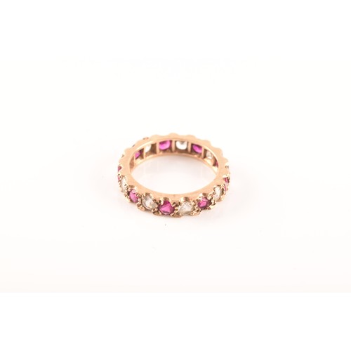 50 - A yellow metal, red and white paste stone eternity ring (unmarked), size K, a 9ct yellow gold red an... 