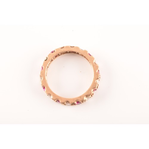 50 - A yellow metal, red and white paste stone eternity ring (unmarked), size K, a 9ct yellow gold red an... 