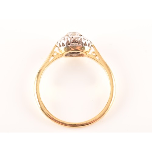 51 - A 18ct yellow gold diamond coronet cluster ring, set to centre with a round brilliant cut diamond se... 